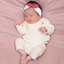 Cinta jersey para pelo de bebé con lazo plumetis rose fuchsia